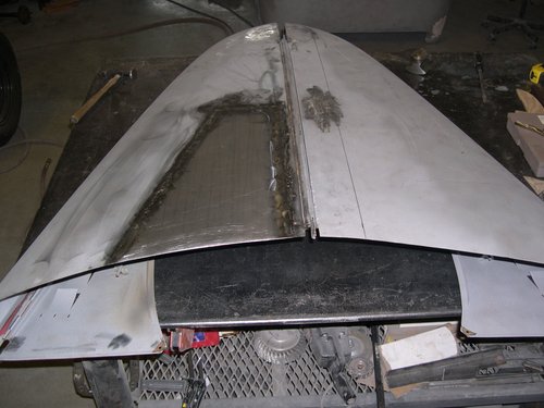 New hood section welding into position.