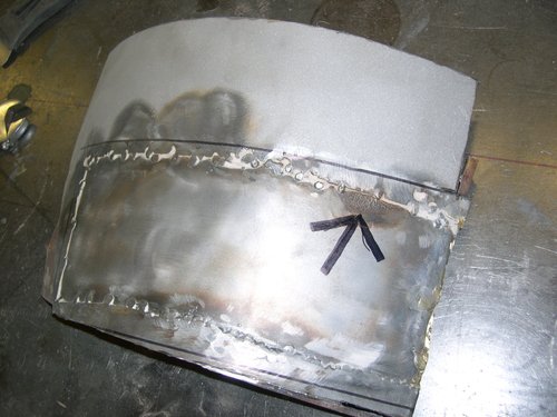 See where the old lap welded patch panel held moisture and was once again rusting?
