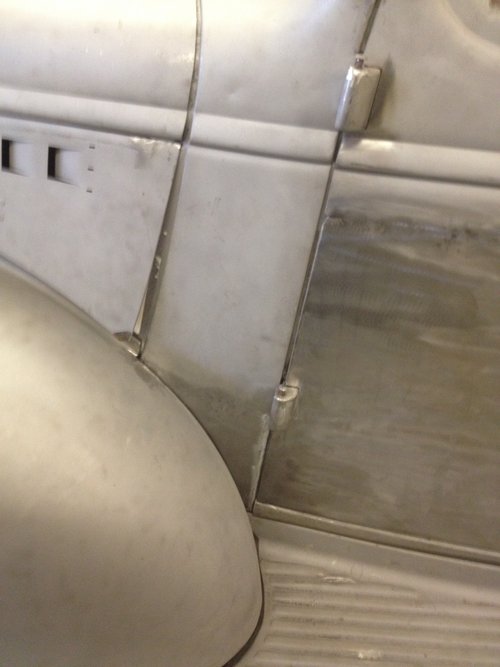 Lower cowl panel seen here after hammer welding, metal finishing and body assembly.