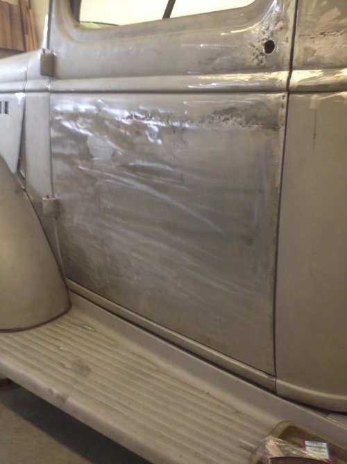 Newly skinned doors back in place